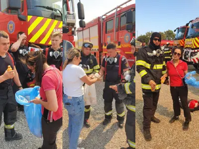 Pompierii români primesc apă și hrană de la localnicii din Rodos Foto: IGSU