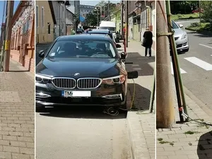 BMW încărcat cu prelungitorul tras pe stâlp / Foto: renasterea.ro