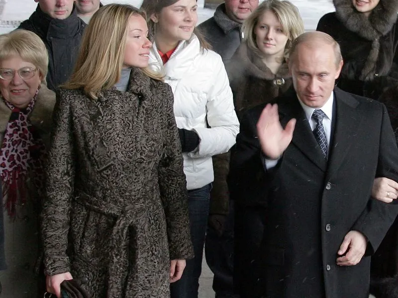 Una dintre puținele imagini cu Maria Vorontsova și Vladimir Putin. / Foto: bloomberg.com