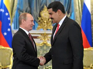 Vladimir Putin și Preşedintele venezuelean Nicolas Maduro. / Foto: stvincenttimes.com