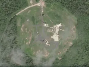 FOTO Super-arma lui Putin a eșuat la testul de lansare. Racheta Satan II a explodat în siloz, făcând un crater vizibil din satelit