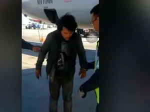 Migrantul din Guatemala s-a ascuns în compartimentul roților avionului. FOTO: Captură video