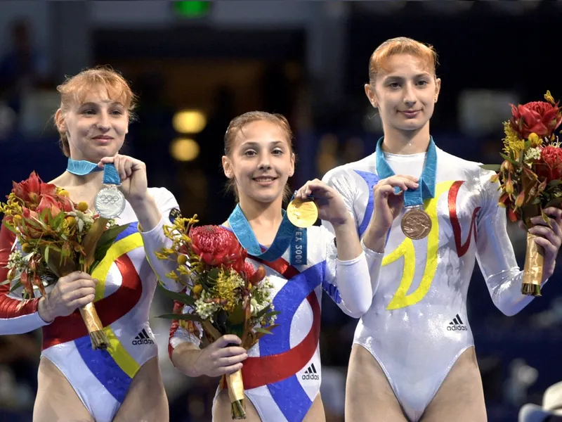 Simona Amânar. Andreea Răducan și Maria Olaru pe podium, la Jocurile Olimpice de la Sidney din 2000 Foto: profimediaimages.ro