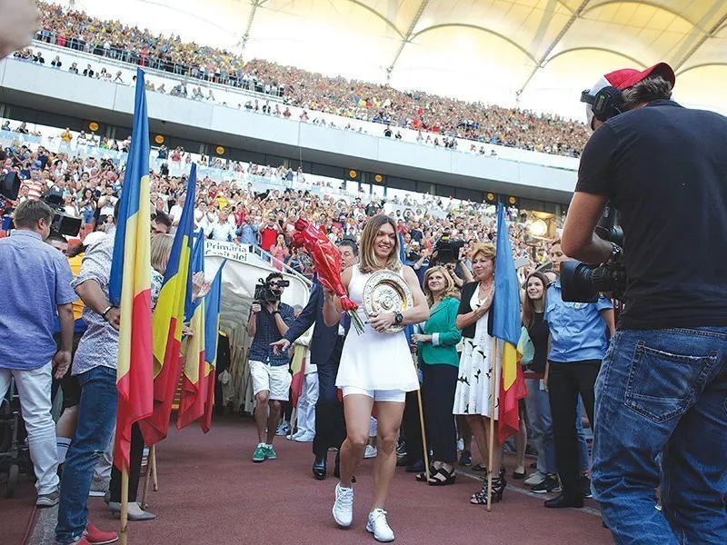 Iulie 2019–pe Arena Națională din București, cu trofeul de la Wimbledon