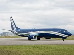 Boeing 737-900ER, aeronava cu care a zburat președintele Klaus Iohannis în Japonia și SIngapore - Foto: Boardingpass / Facebook