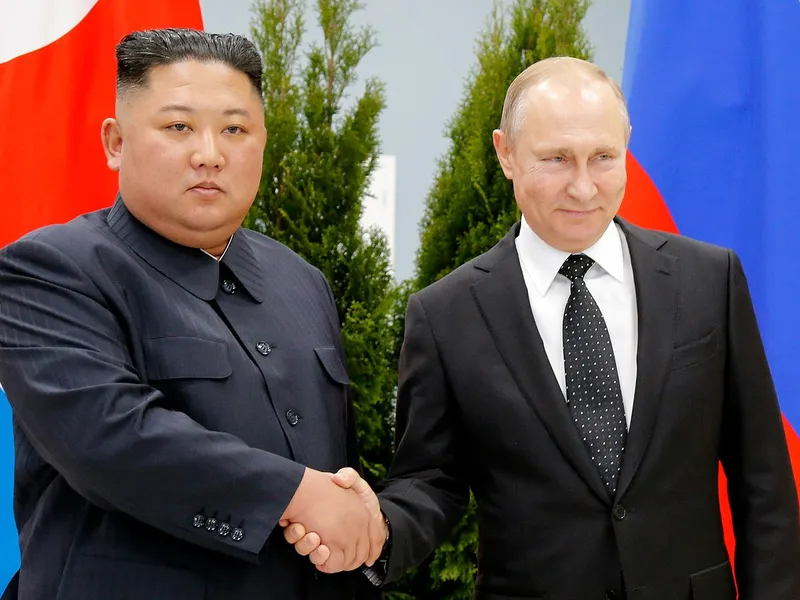 Dictatorii Kim Jong-Un și Vladimir Putin - Foto: Profimedia images