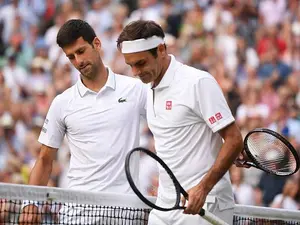 Novak Djokovic și Roger Federer, după o finală incredibilă. Foto Getty Images