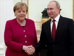 Merkel intervine pe lângă Putin să încheie criza migranților Belarus-Polonia/foto: reuters