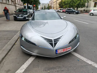 E-Car, prima mașină electrică 100% românească, un coupe în 4 uși ca un OZN. Maximum 120 km/h - Foto: cluj24.ro