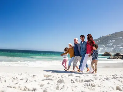 Familie în vacanță - Foto: Profimedia