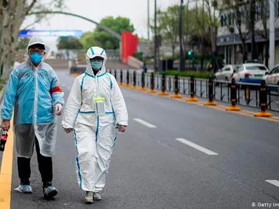 Oameni în Wuhan/FOTO: Getty